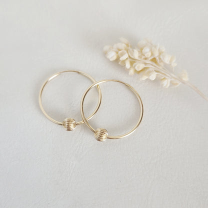 Aro argolla Oro 14K G.F 24 mm con bolita facetada