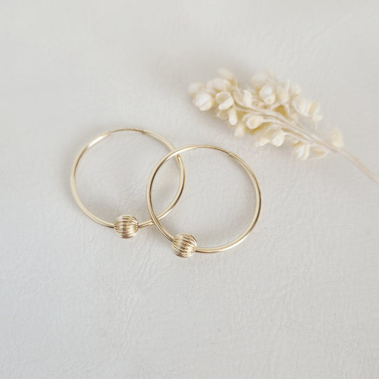 Aro argolla Oro 14K G.F 24 mm con bolita facetada