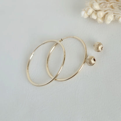 Aro argolla Oro 14K G.F 24 mm con bolita facetada